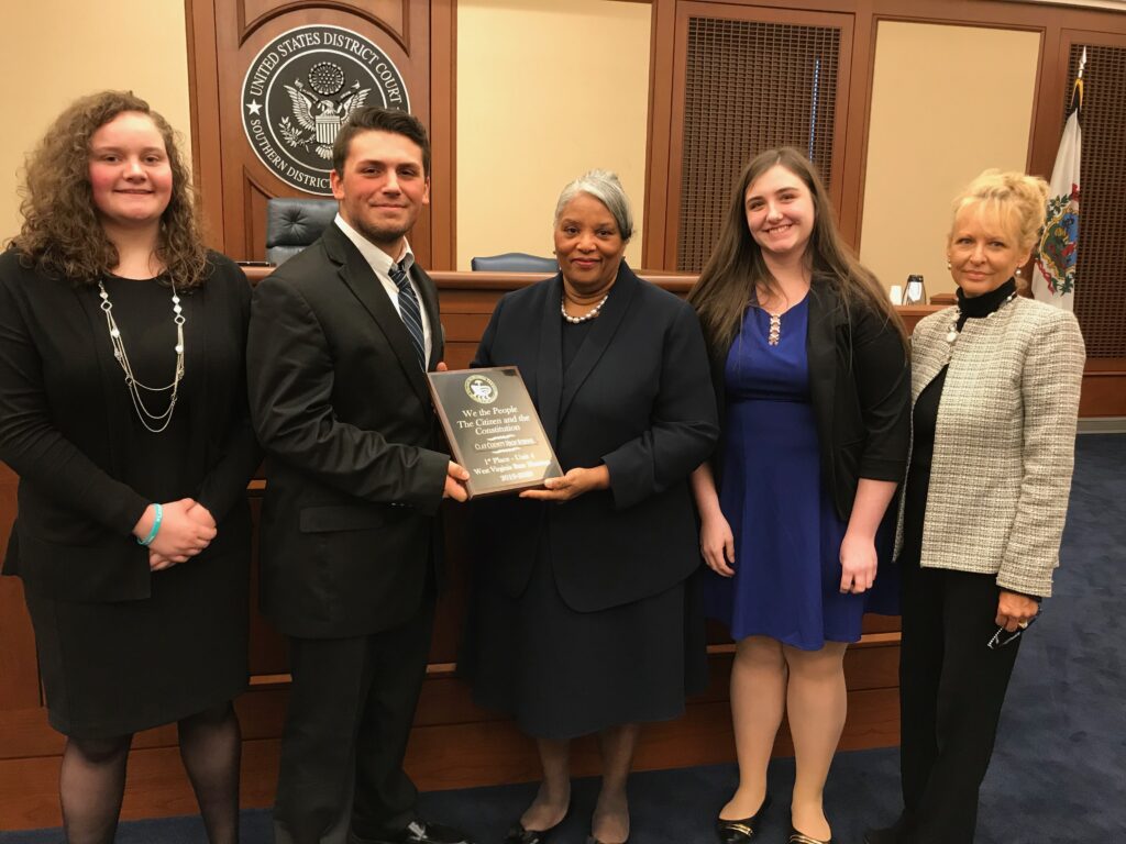 Julia Holcomb, Tyler Cummings, Judge Irene Burger, Kelsey Prather, and the "We the People" State Director